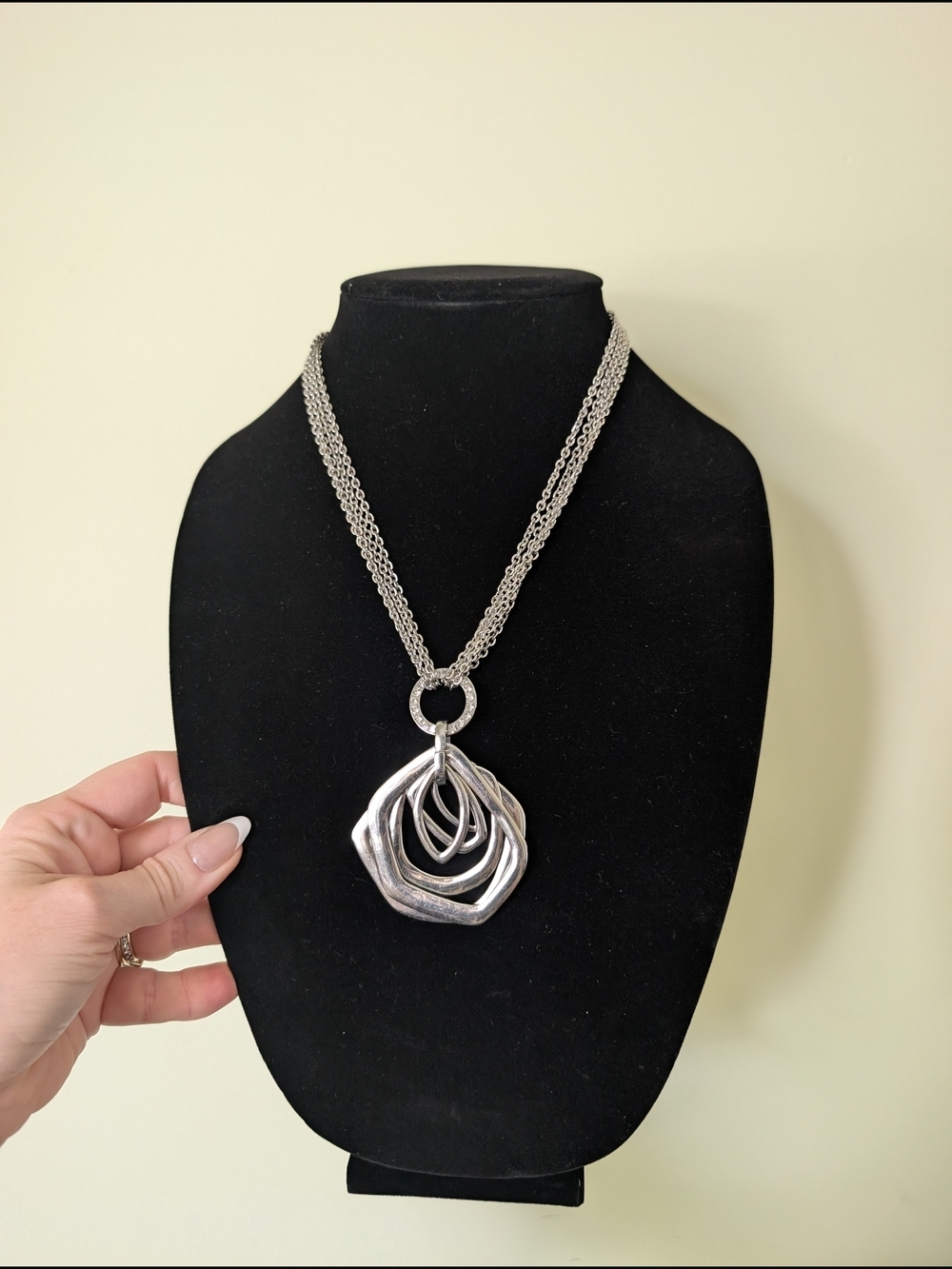 Elegant Silver Multi-Ring Pendant Necklace
